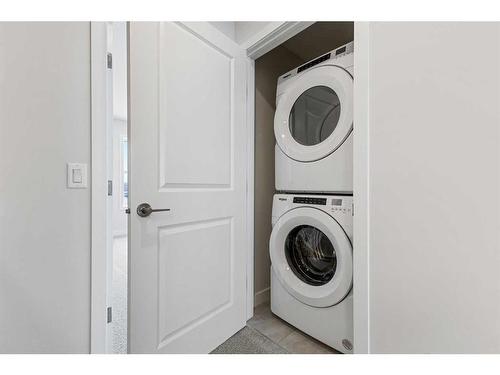 20158 45 Street Se, Calgary, AB - Indoor Photo Showing Laundry Room