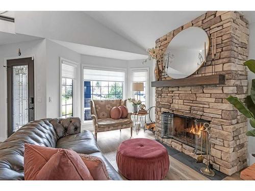 303 Coral Sands Terrace Ne, Calgary, AB - Indoor Photo Showing Living Room With Fireplace