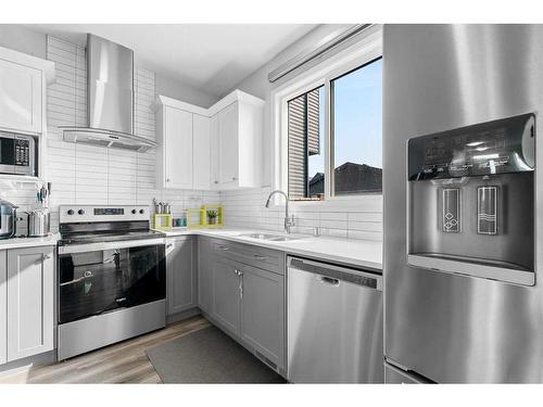 183 Seton Heath Se, Calgary, AB - Indoor Photo Showing Kitchen With Stainless Steel Kitchen