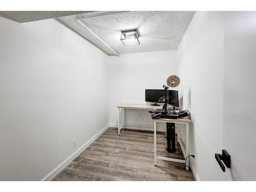 11 Alcock Close, Okotoks, AB - Indoor Photo Showing Office