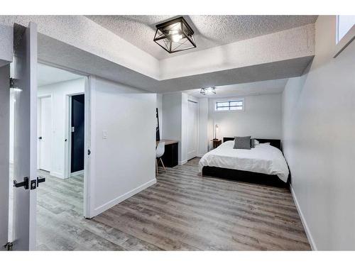 11 Alcock Close, Okotoks, AB - Indoor Photo Showing Bedroom