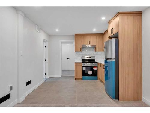 2037 27 Street Se, Calgary, AB - Indoor Photo Showing Kitchen With Stainless Steel Kitchen