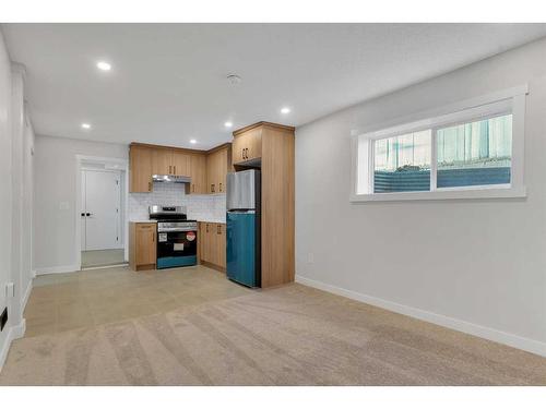 2037 27 Street Se, Calgary, AB - Indoor Photo Showing Kitchen With Stainless Steel Kitchen