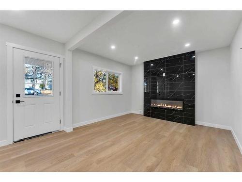 2037 27 Street Se, Calgary, AB - Indoor With Fireplace