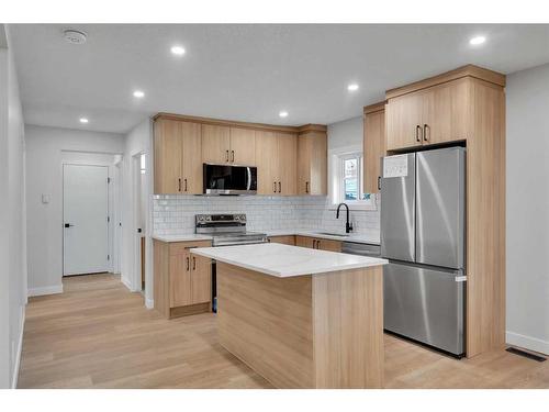 2037 27 Street Se, Calgary, AB - Indoor Photo Showing Kitchen With Stainless Steel Kitchen