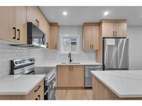 2037 27 Street Se, Calgary, AB - Indoor Photo Showing Kitchen With Stainless Steel Kitchen With Upgraded Kitchen