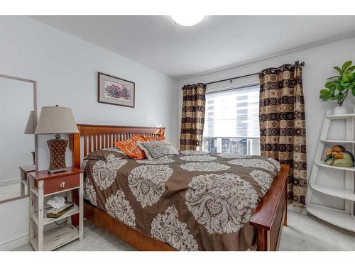 32 Clydesdale Crescent, Cochrane, AB - Indoor Photo Showing Bedroom