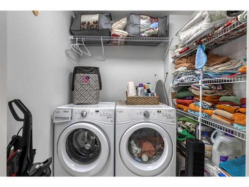 32 Clydesdale Crescent, Cochrane, AB - Indoor Photo Showing Laundry Room