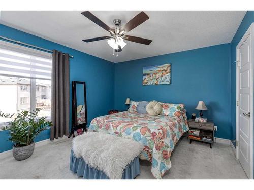 32 Clydesdale Crescent, Cochrane, AB - Indoor Photo Showing Bedroom