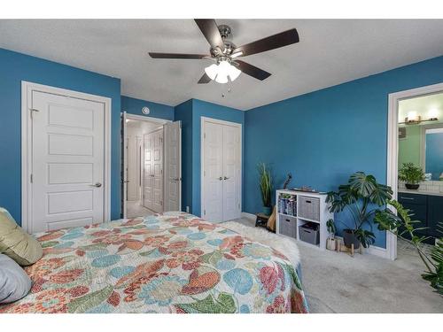 32 Clydesdale Crescent, Cochrane, AB - Indoor Photo Showing Bedroom