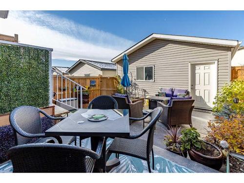 32 Clydesdale Crescent, Cochrane, AB - Outdoor With Deck Patio Veranda With Exterior