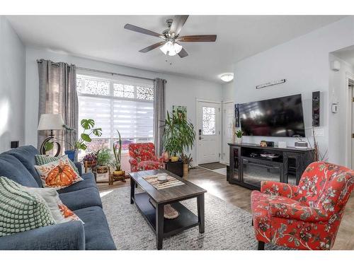 32 Clydesdale Crescent, Cochrane, AB - Indoor Photo Showing Living Room