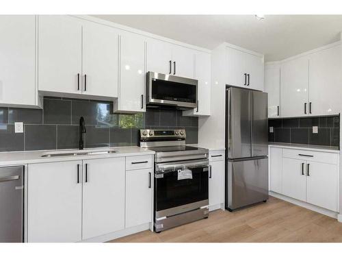 94 Haysboro Crescent Sw, Calgary, AB - Indoor Photo Showing Kitchen With Stainless Steel Kitchen With Upgraded Kitchen