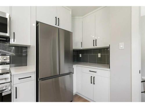 94 Haysboro Crescent Sw, Calgary, AB - Indoor Photo Showing Kitchen With Stainless Steel Kitchen