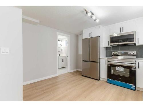 94 Haysboro Crescent Sw, Calgary, AB - Indoor Photo Showing Kitchen With Stainless Steel Kitchen