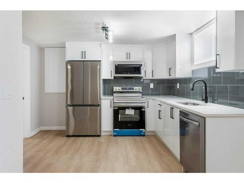 94 Haysboro Crescent Sw, Calgary, AB - Indoor Photo Showing Kitchen With Stainless Steel Kitchen