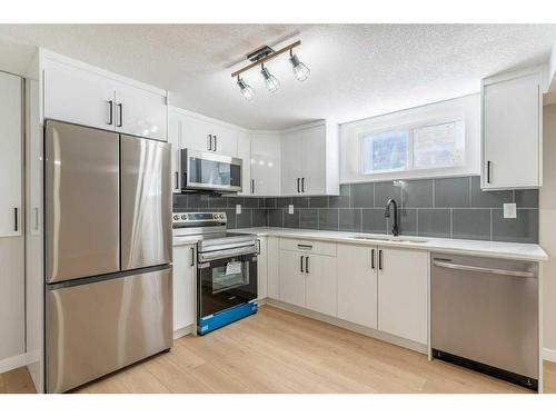 94 Haysboro Crescent Sw, Calgary, AB - Indoor Photo Showing Kitchen With Stainless Steel Kitchen