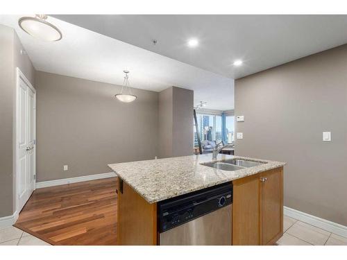 2301-910 5 Avenue Sw, Calgary, AB - Indoor Photo Showing Kitchen With Double Sink