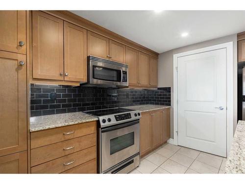 2301-910 5 Avenue Sw, Calgary, AB - Indoor Photo Showing Kitchen