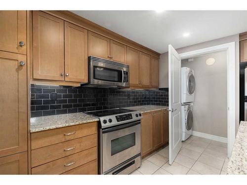 2301-910 5 Avenue Sw, Calgary, AB - Indoor Photo Showing Kitchen