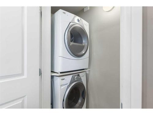 2301-910 5 Avenue Sw, Calgary, AB - Indoor Photo Showing Laundry Room