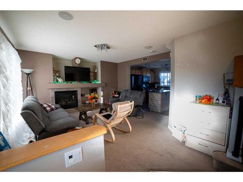 184 Copperfield Rise Se, Calgary, AB - Indoor With Fireplace