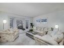 16 Woodmont Green Sw, Calgary, AB  - Indoor Photo Showing Living Room 