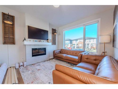 77 Homestead Boulevard Ne, Calgary, AB - Indoor Photo Showing Living Room With Fireplace