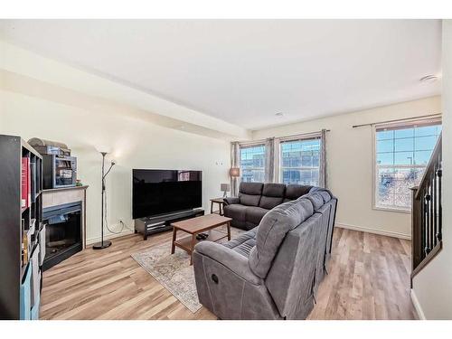 15-43 Springborough Boulevard Sw, Calgary, AB - Indoor Photo Showing Living Room With Fireplace