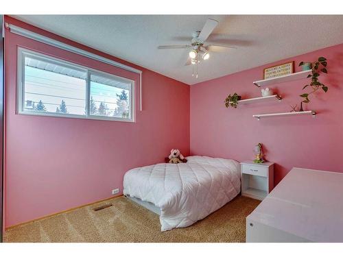 308 Sackville Drive Sw, Calgary, AB - Indoor Photo Showing Bedroom