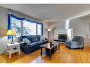 308 Sackville Drive Sw, Calgary, AB  - Indoor Photo Showing Living Room With Fireplace 