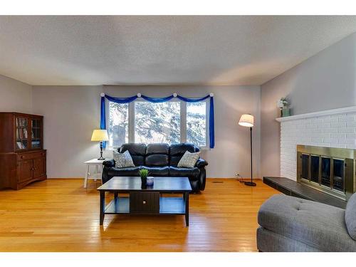 308 Sackville Drive Sw, Calgary, AB - Indoor Photo Showing Living Room With Fireplace