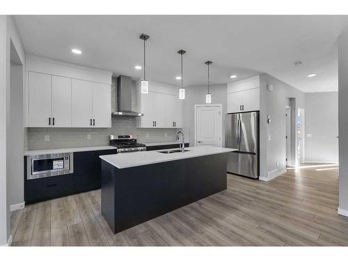 3163 Chinook Winds Drive Sw, Airdrie, AB - Indoor Photo Showing Kitchen With Stainless Steel Kitchen With Upgraded Kitchen