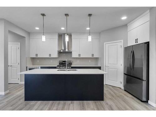 3163 Chinook Winds Drive Sw, Airdrie, AB - Indoor Photo Showing Kitchen With Double Sink With Upgraded Kitchen