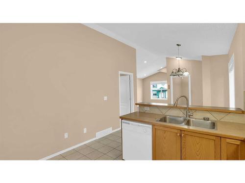 40 Saddlefield Road Ne, Calgary, AB - Indoor Photo Showing Kitchen With Double Sink