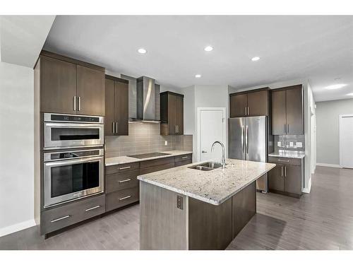 90 Sage Meadows Way Nw, Calgary, AB - Indoor Photo Showing Kitchen With Double Sink With Upgraded Kitchen