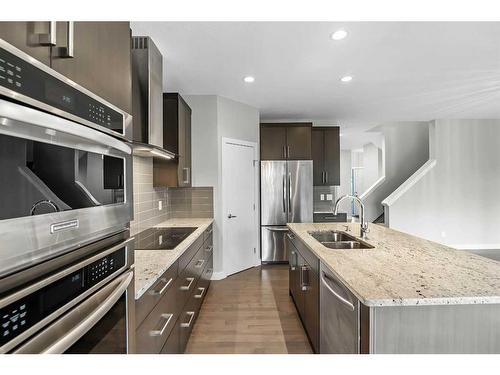 90 Sage Meadows Way Nw, Calgary, AB - Indoor Photo Showing Kitchen With Double Sink With Upgraded Kitchen