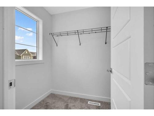 37 Amblefield Passage Nw, Calgary, AB - Indoor With Storage