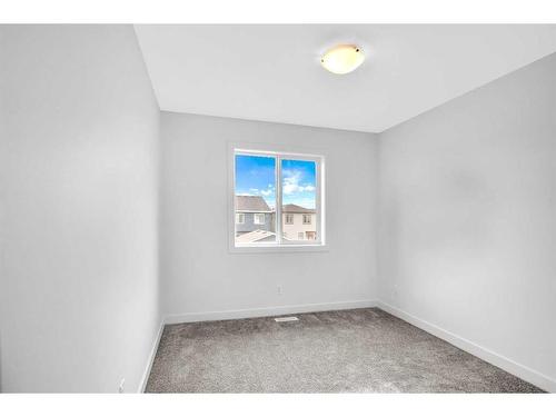 37 Amblefield Passage Nw, Calgary, AB - Indoor Photo Showing Other Room