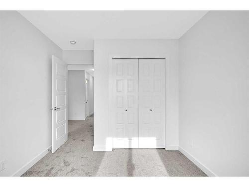 37 Amblefield Passage Nw, Calgary, AB - Indoor Photo Showing Other Room