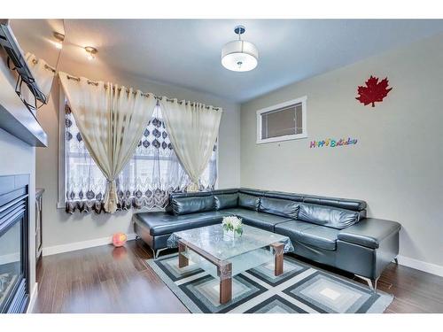 136 Redstone View Ne, Calgary, AB - Indoor Photo Showing Living Room With Fireplace