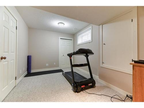 303 Royal Birch View Nw, Calgary, AB - Indoor Photo Showing Gym Room