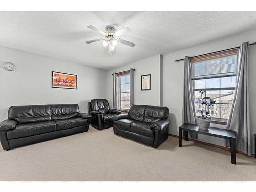 81 Covebrook Close Ne, Calgary, AB - Indoor Photo Showing Living Room