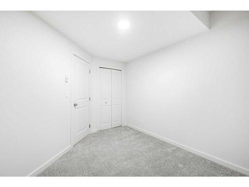 184 Belmont Way Sw, Calgary, AB - Indoor Photo Showing Other Room