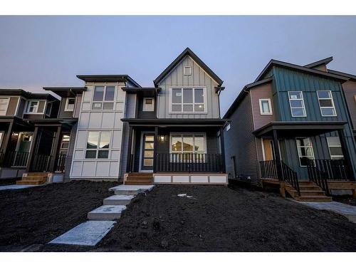 184 Belmont Way Sw, Calgary, AB - Outdoor With Deck Patio Veranda With Facade