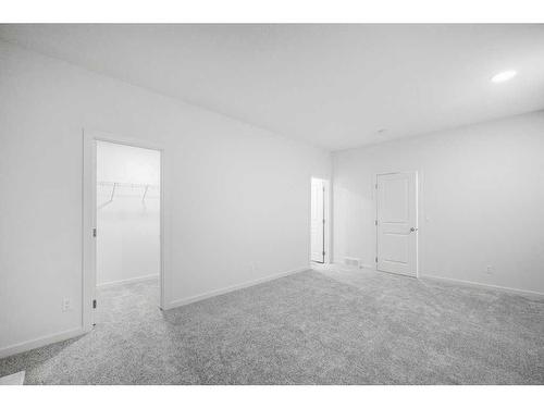 184 Belmont Way Sw, Calgary, AB - Indoor Photo Showing Other Room