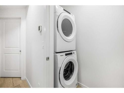 184 Belmont Way Sw, Calgary, AB - Indoor Photo Showing Laundry Room