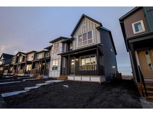 184 Belmont Way Sw, Calgary, AB - Outdoor With Deck Patio Veranda With Facade