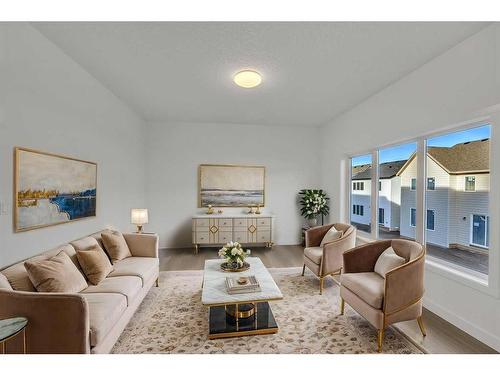 305 Baneberry Way Sw, Airdrie, AB - Indoor Photo Showing Living Room