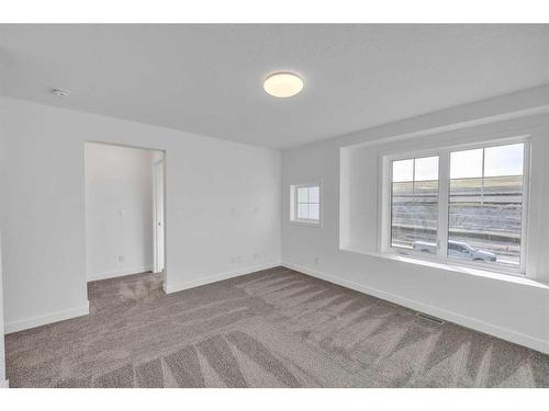 305 Baneberry Way Sw, Airdrie, AB - Indoor Photo Showing Other Room